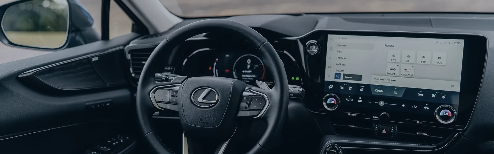 Car interior with steering wheel and dashboard