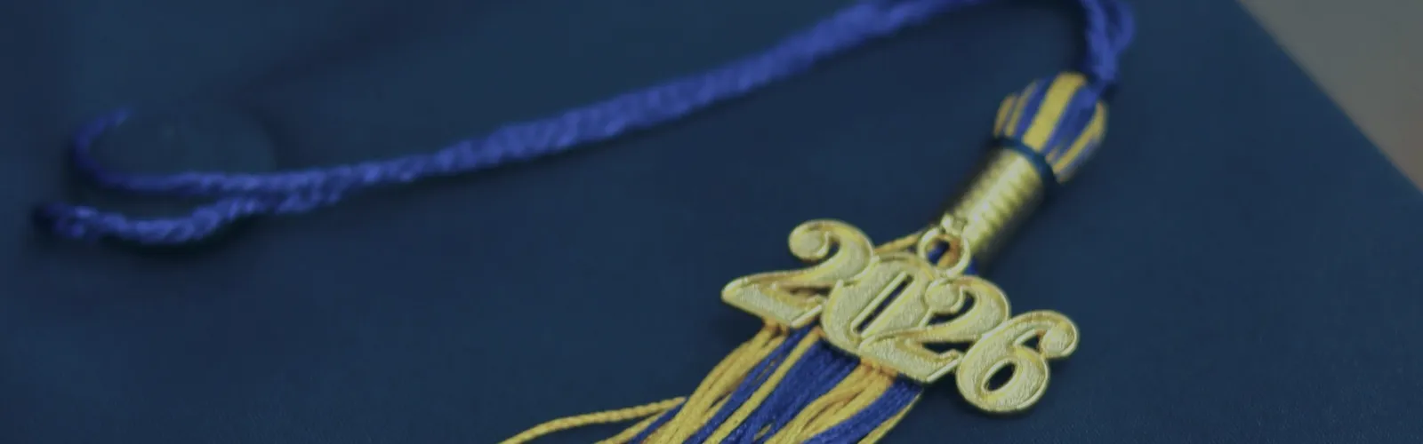 Graduation cap with a gold 2026 tassel
